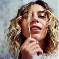 Image of Chelcee Grimes linking to their artist page due to link from them being at the top of the main table on this page