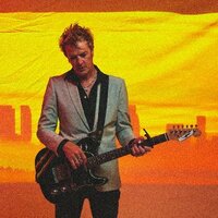 Image of Chris Cheney linking to their artist page due to link from them being at the top of the main table on this page