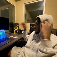 Image of GuiltyBeatz linking to their artist page due to link from them being at the top of the main table on this page