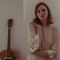 Image of Karen Elson linking to their artist page due to link from them being at the top of the main table on this page