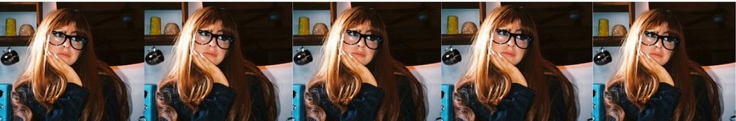 Large banner image of Capri Everitt linking to their artist page due to them being the most commonly displayed artist on this title page