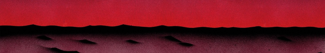 Large banner image of King Krule linking to their artist page due to them being the most commonly displayed artist on this title page