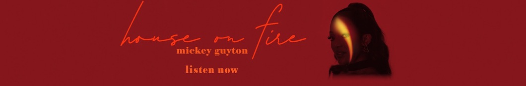Large banner image of Mickey Guyton linking to their artist page due to them being the most commonly displayed artist on this title page