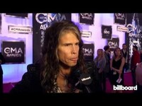 Thumbnail for the Steven Tyler - Aerosmith on the CMA Awards Red Carpet 2014 link, provided by host site