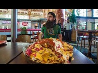 Thumbnail for the Beard Meats Food - ATTEMPTING AN UNEXPECTEDLY SPICY NACHO MOUNTAIN CHALLENGE | BeardMeatsFood link, provided by host site