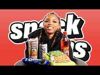Thumbnail for the Chloe - Bailey Compares British and American Snacks | Snack Wars link, provided by host site