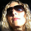 Image of Suz linking to their artist page due to link from them being at the top of the main table on this page