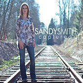 Image of Sandy Smith linking to their artist page due to link from them being at the top of the main table on this page