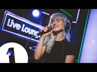 Thumbnail for the Paramore - Cover Drake's Passionfruit in the Live Lounge link, provided by host site