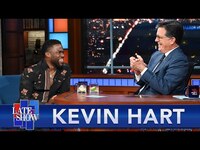 Thumbnail for the Stephen Colbert - Stephen Cracks Open The Tequila For Fellow Talk Show Host Kevin Hart link, provided by host site