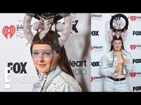 Thumbnail for the JoJo Siwa - Details Her SHOCKING Look For The iHeart Radio Music Awards 2025 | E! Insider link, provided by host site