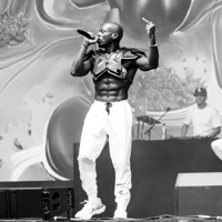 Image of Tobi Lou linking to their artist page due to link from them being at the top of the main table on this page