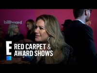 Thumbnail for the Kelly Clarkson - Dishes on "The Voice" and Blake Shelton | E! Red Carpet & Award Shows link, provided by host site
