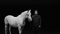 Image of Adel Tawil linking to their artist page due to link from them being at the top of the main table on this page