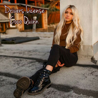 Thumbnail for the Coco Quinn - Drivers License link, provided by host site