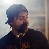 Image of Jared Dines linking to their artist page due to link from them being at the top of the main table on this page