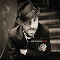 Image of Charlie Winston linking to their artist page due to link from them being at the top of the main table on this page