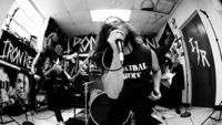 Image of Iron Reagan linking to their artist page due to link from them being at the top of the main table on this page