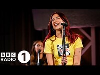 Thumbnail for the Dua Lipa - Illusion in the Radio 1 Live Lounge link, provided by host site