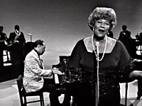 Thumbnail for the Ella Fitzgerald - It Don't Mean A Thing (If It Ain't Got That Swing) [Live On The Ed Sullivan Show, March 7, 1965] link, provided by host site
