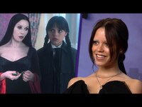 Thumbnail for the Wednesday - Jenna Ortega on Ditching Love Interests and DUELING Catherine Zeta-Jones link, provided by host site