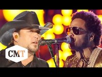 Thumbnail for the Jason Aldean - & Lenny Kravitz Perform “American Woman” at 2013 CMT Music Awards link, provided by host site