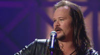 Thumbnail for the Travis Tritt - Long Haired Country Boy link, provided by host site