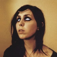 Image of Chelsea Wolfe linking to their artist page due to link from them being at the top of the main table on this page