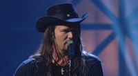 Thumbnail for the Travis Tritt - Modern Day Bonnie and Clyde link, provided by host site