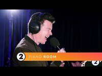 Thumbnail for the Rick Astley - Never Gonna Give You Up (Radio 2 Piano Room) link, provided by host site
