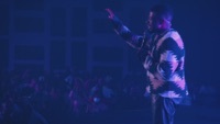 Image of Travis Greene linking to their artist page due to link from them being at the top of the main table on this page