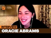 Thumbnail for the Gracie Abrams - On 'Risk', her superfans & new album 'The Secret of Us' (Interview) link, provided by host site