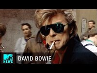 Thumbnail for the David Bowie - & Peter Frampton Search for Beer in Madrid | MTV News link, provided by host site