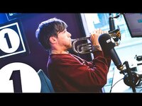 Thumbnail for the Louis Tomlinson - Plays trumpet and talks Tobey Maguire, Niall and Pelé link, provided by host site