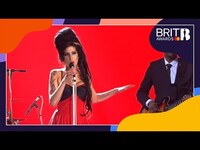 Thumbnail for the Amy Winehouse - Rehab (Live at The BRITs 2007) link, provided by host site