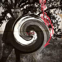 Image of Ian Frequency linking to their artist page due to link from them being at the top of the main table on this page
