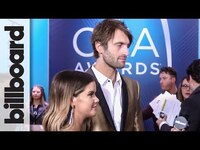 Thumbnail for the Maren Morris - & Ryan Hurd Talk New Music, Their Wedding, & More | CMAs 2018 link, provided by host site