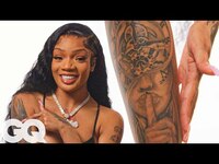Thumbnail for the Glorilla - Shows Off Her Tattoos | Tattoo Tour | GQ link, provided by host site