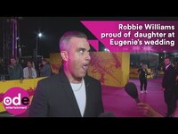 Thumbnail for the Robbie Williams - SO proud of his daughter at Princess Eugenie’s royal wedding link, provided by host site