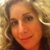Image of Suz linking to their artist page due to link from them being at the top of the main table on this page