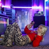 Image of Coco Quinn linking to their artist page due to link from them being at the top of the main table on this page