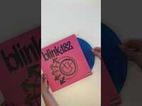 Thumbnail for the blink-182 - Thee last variant in beautiful blue & black swirl. Get it while you can at the merch store 💙 link, provided by host site