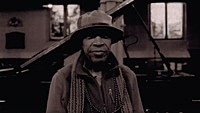 Thumbnail for the Laraaji - This Too Shall Pass link, provided by host site
