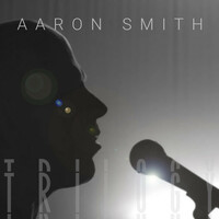 Image of Aaron Smith linking to their artist page due to link from them being at the top of the main table on this page