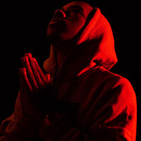 Image of Poncho linking to their artist page due to link from them being at the top of the main table on this page