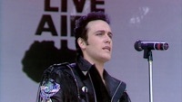 Thumbnail for the Adam Ant - Vive Le Rock (Live at Live Aid, Wembley Stadium, 13th July 1985) link, provided by host site