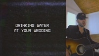 Thumbnail for the Greylan James - Water At A Wedding (Lyric Video) link, provided by host site