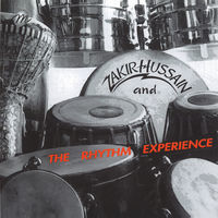 Thumbnail for the Zakir Hussain - Zakir Hussain and The Rhythm Experience link, provided by host site